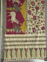 Shop handpainted Chettinad cotton Kalamkari saree featuring traditional Nandi and botanical artwork. Breathable, handloom luxury online at Kapaas Katha.