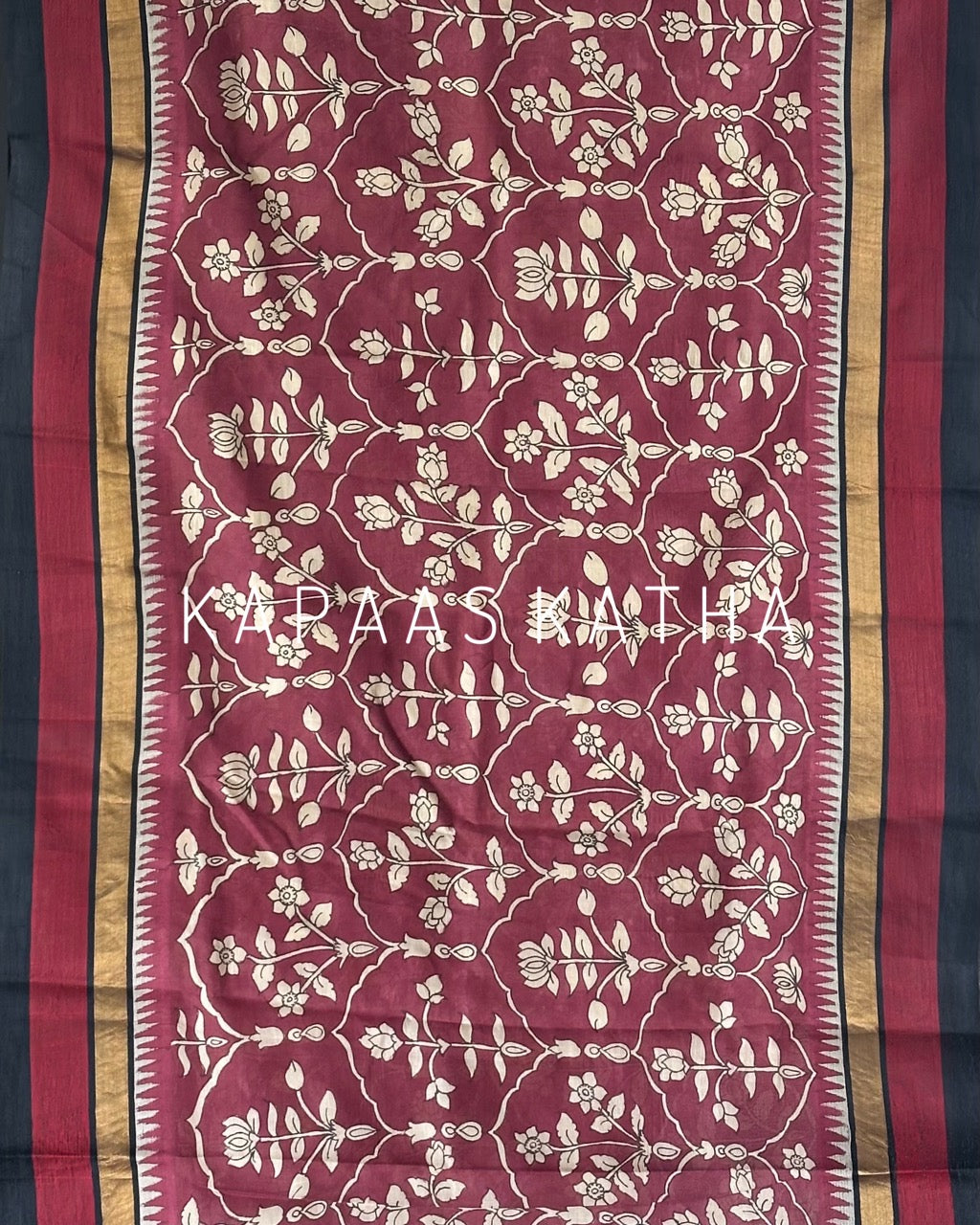 Shop handpainted Chettinad cotton silk Kalamkari saree in maroon with contrast black temple zari border. Lightweight handloom elegance online at Kapaas Katha.