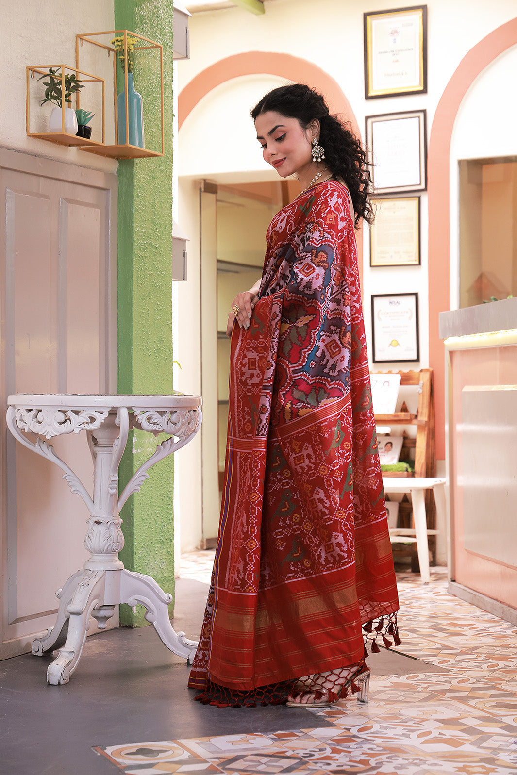 Stylish Handloom Red Mulberry Silk Ikat Patola Saree with Intricate Animal and Floral Motifs
