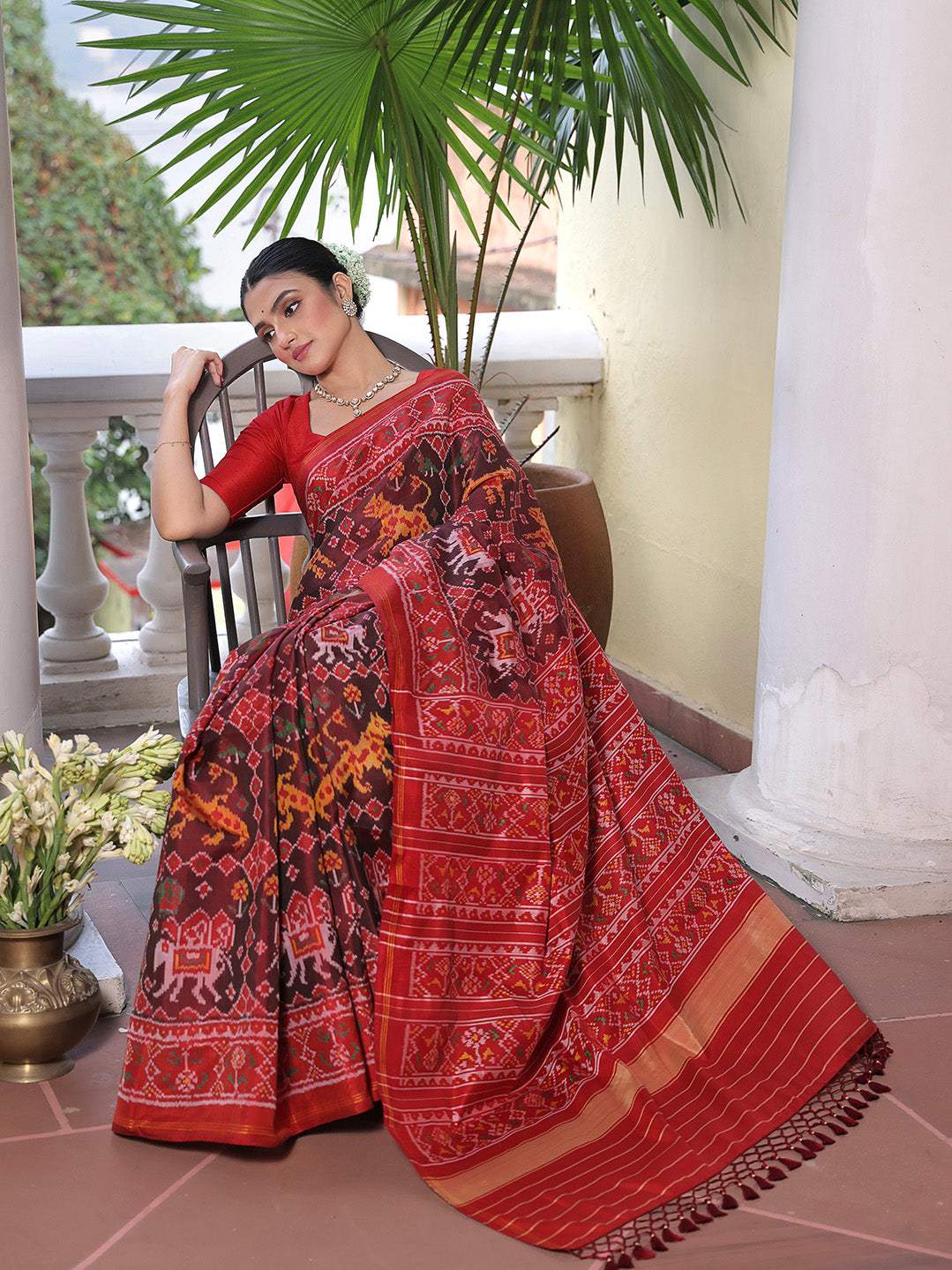 Graceful Handloom Brown and Red Mulberry Silk Ikat Patola Saree with Tiger and Elephant Motifs