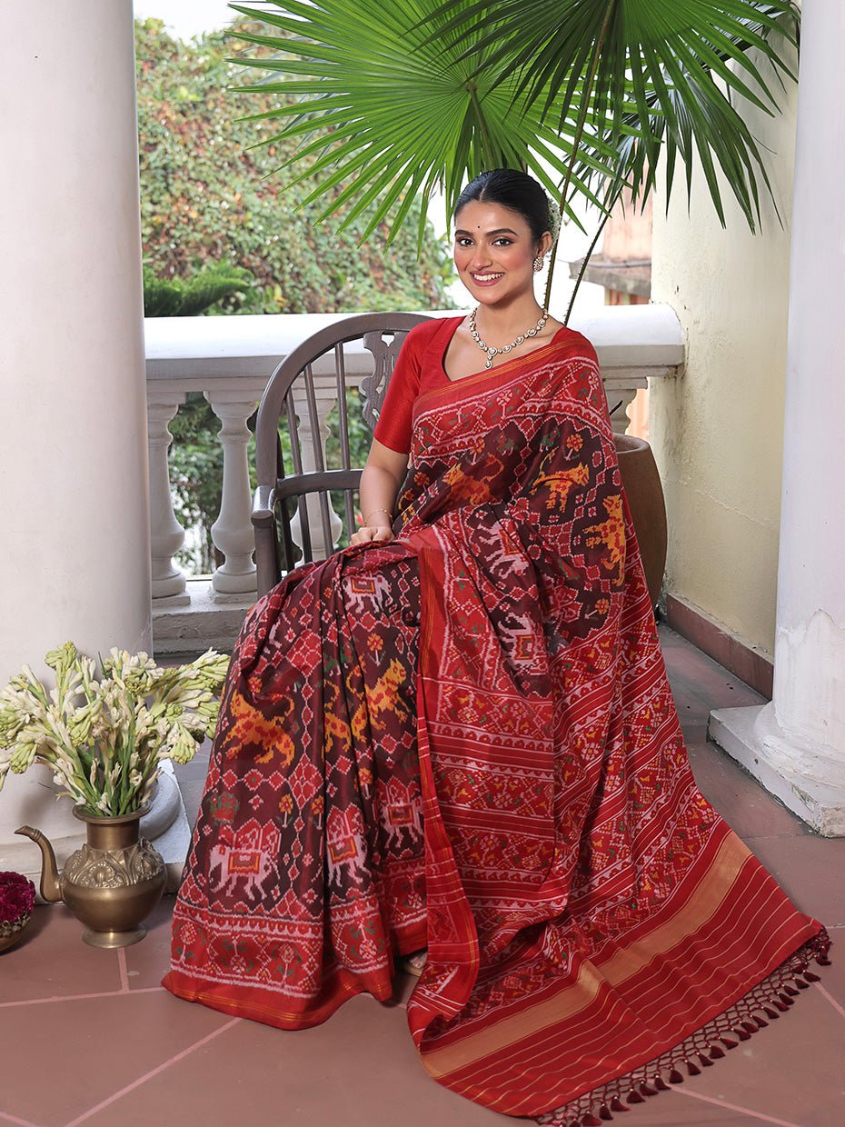 Graceful Handloom Brown and Red Mulberry Silk Ikat Patola Saree with Tiger and Elephant Motifs