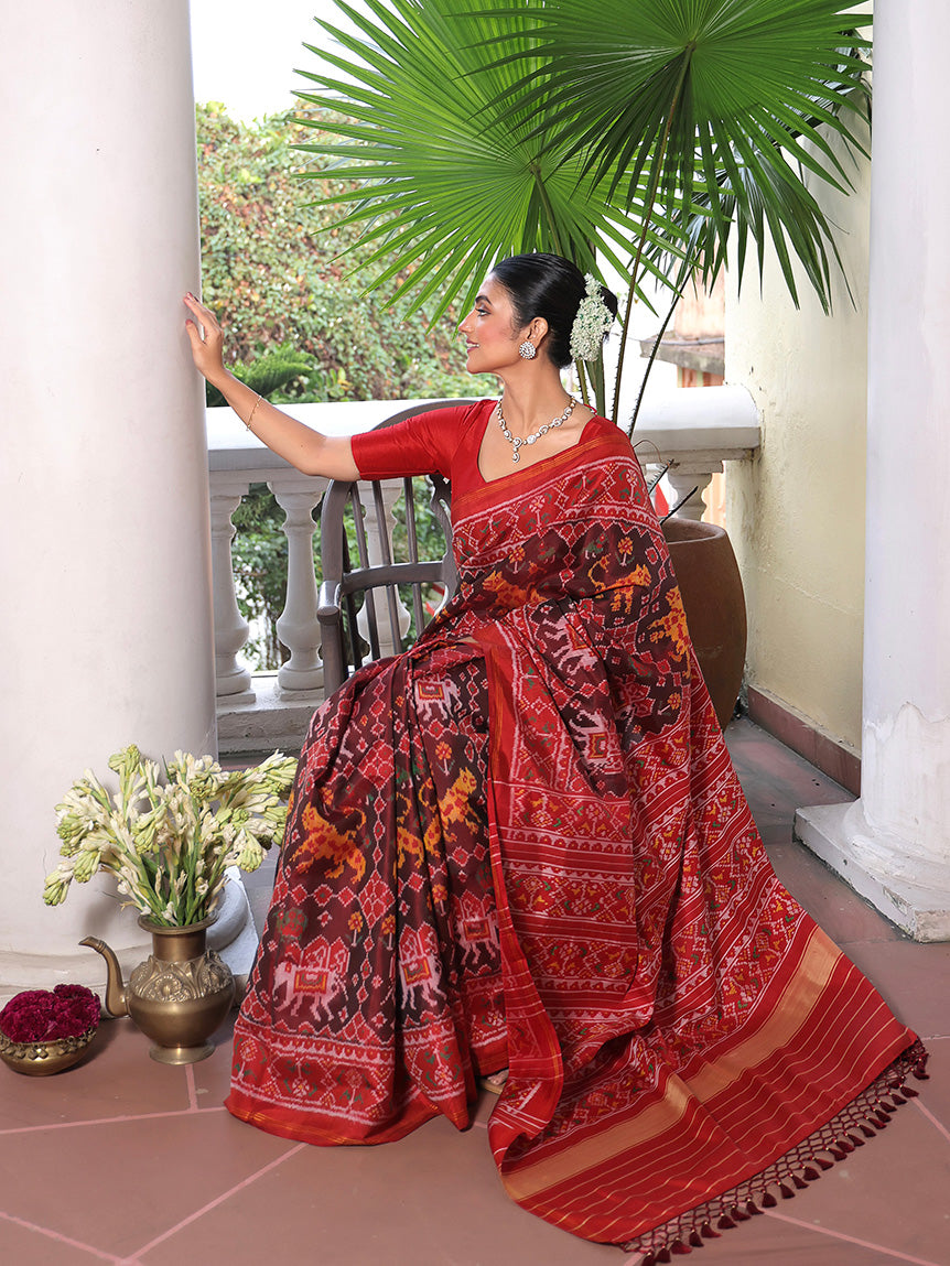 Graceful Handloom Brown and Red Mulberry Silk Ikat Patola Saree with Tiger and Elephant Motifs