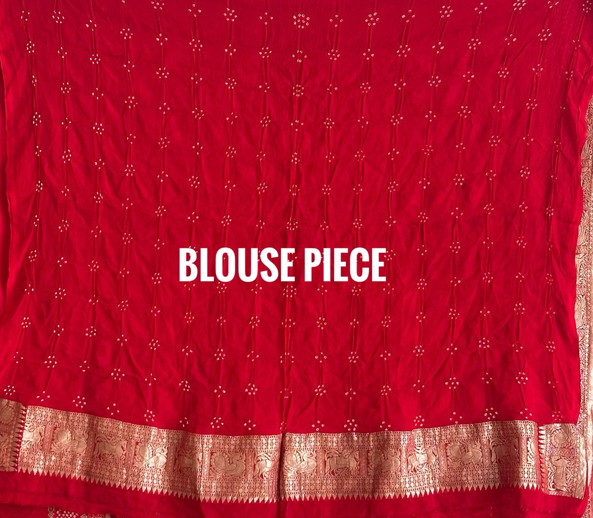 Buy pure Banarasi georgette Bandhani saree in vermilion red with gold zari elephant motifs & rich woven pallu. Authentic handloom luxury online at Kapaas Katha.