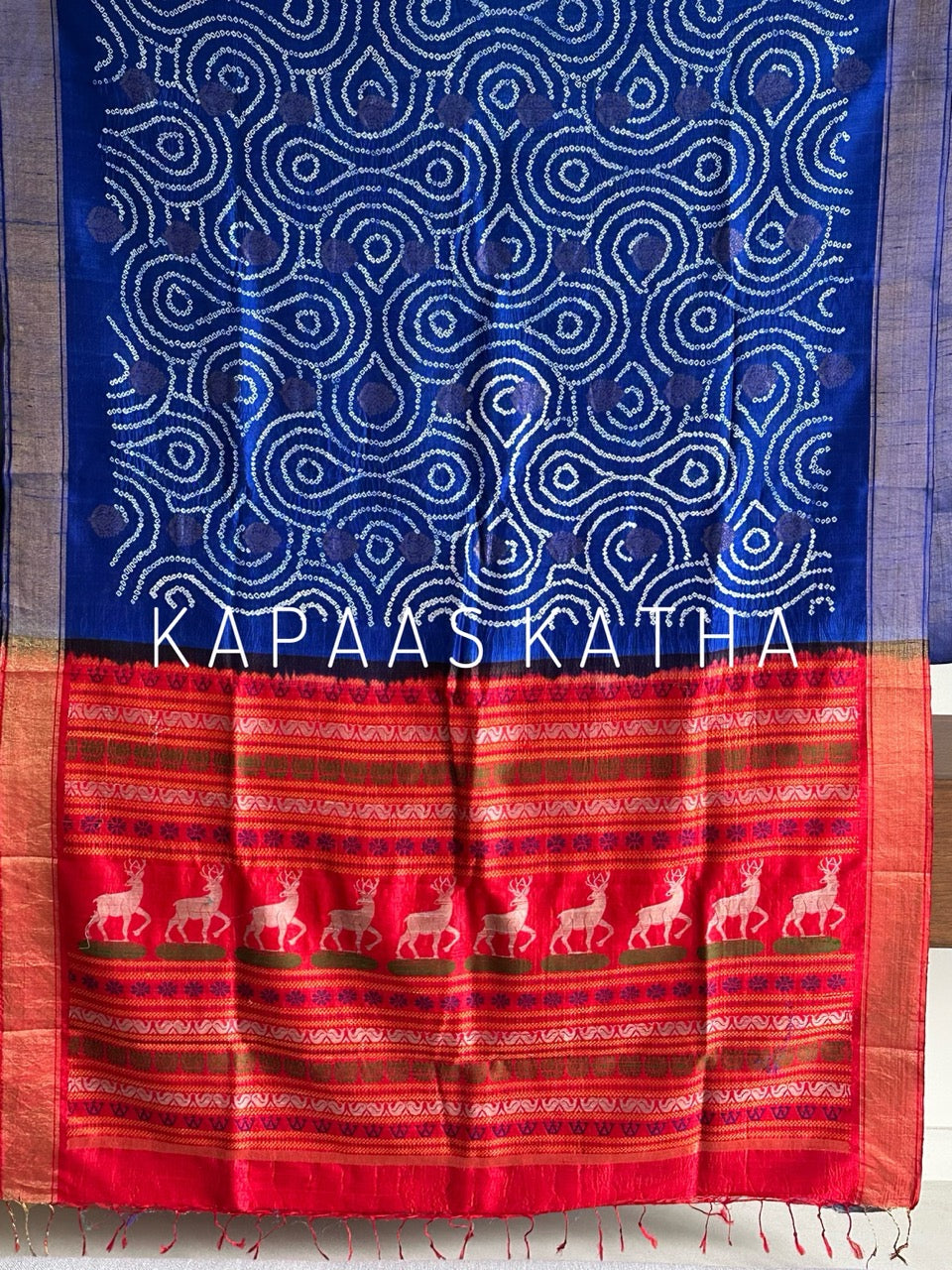 Munga Silk Bandhani Saree, Pure Silk Blue Bandhani Saree, Contrast Deer Motif Zari Pallu Saree, Kapaas Katha Designer Sarees, Hand-Tied Munga Silk Sarees Online