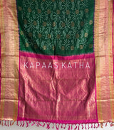 Vasundhara Silk Bandhani Saree, Pure Silk Green Bandhani Saree, Contrast Border Bandhej Saree, Kapaas Katha Designer Sarees, Hand-Tied Silk Sarees Online