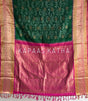 Vasundhara Silk Bandhani Saree, Pure Silk Green Bandhani Saree, Contrast Border Bandhej Saree, Kapaas Katha Designer Sarees, Hand-Tied Silk Sarees Online