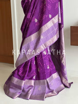 Buy pure Vasundhara silk Bandhani saree in royal magenta purple with gold zari leaf motifs & silver zari border. Authentic handwoven luxury online at Kapaas Katha.