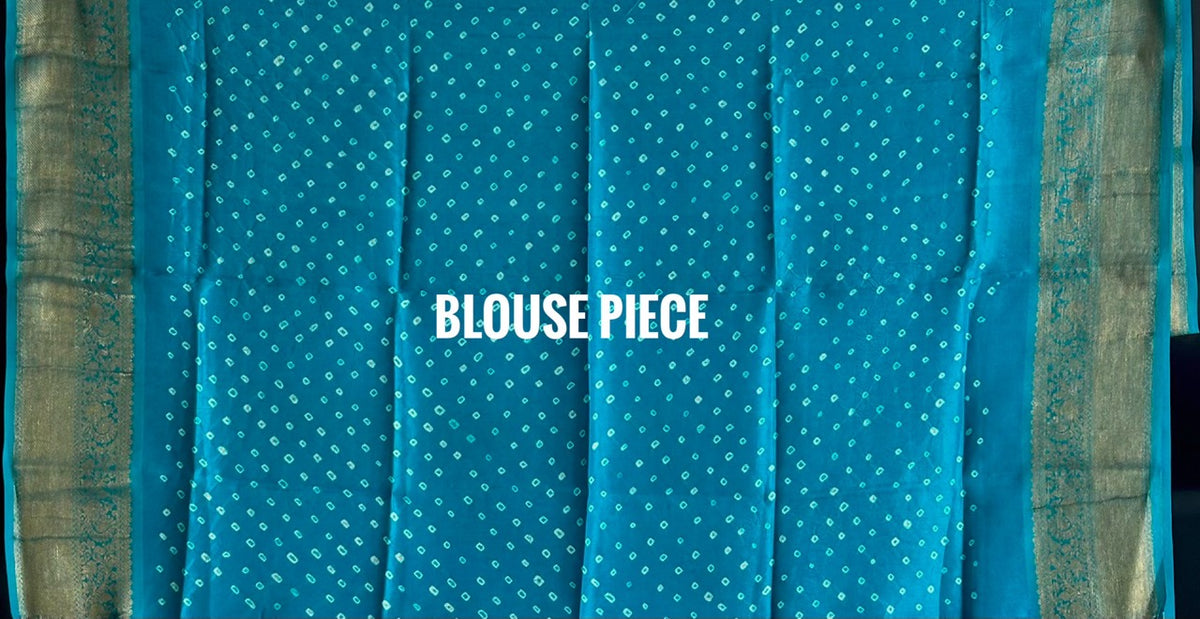 Buy pure Vasundhara silk Bandhani saree in turquoise blue with gold zari leaf motifs & rich pallu. Authentic handwoven luxury online at Kapaas Katha.