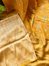 kumudini-kesar-mustard-yellow-handloom-munga-silk-bandhani-saree