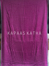 Kapaas Katha presents Leher Grandeur Pure Gajji Silk Bandhani Saree, draped in wave-like bandhani artistry & pure silk grandeur. Shop now!