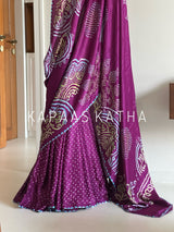 Kapaas Katha presents Leher Grandeur Pure Gajji Silk Bandhani Saree, draped in wave-like bandhani artistry & pure silk grandeur. Shop now!