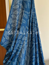 Shop stylish pure Munga Silk Bandhani saree featuring gold zari floral mandalas and paisley pallu. Lightweight, vibrant, and ideal for festive celebrations.