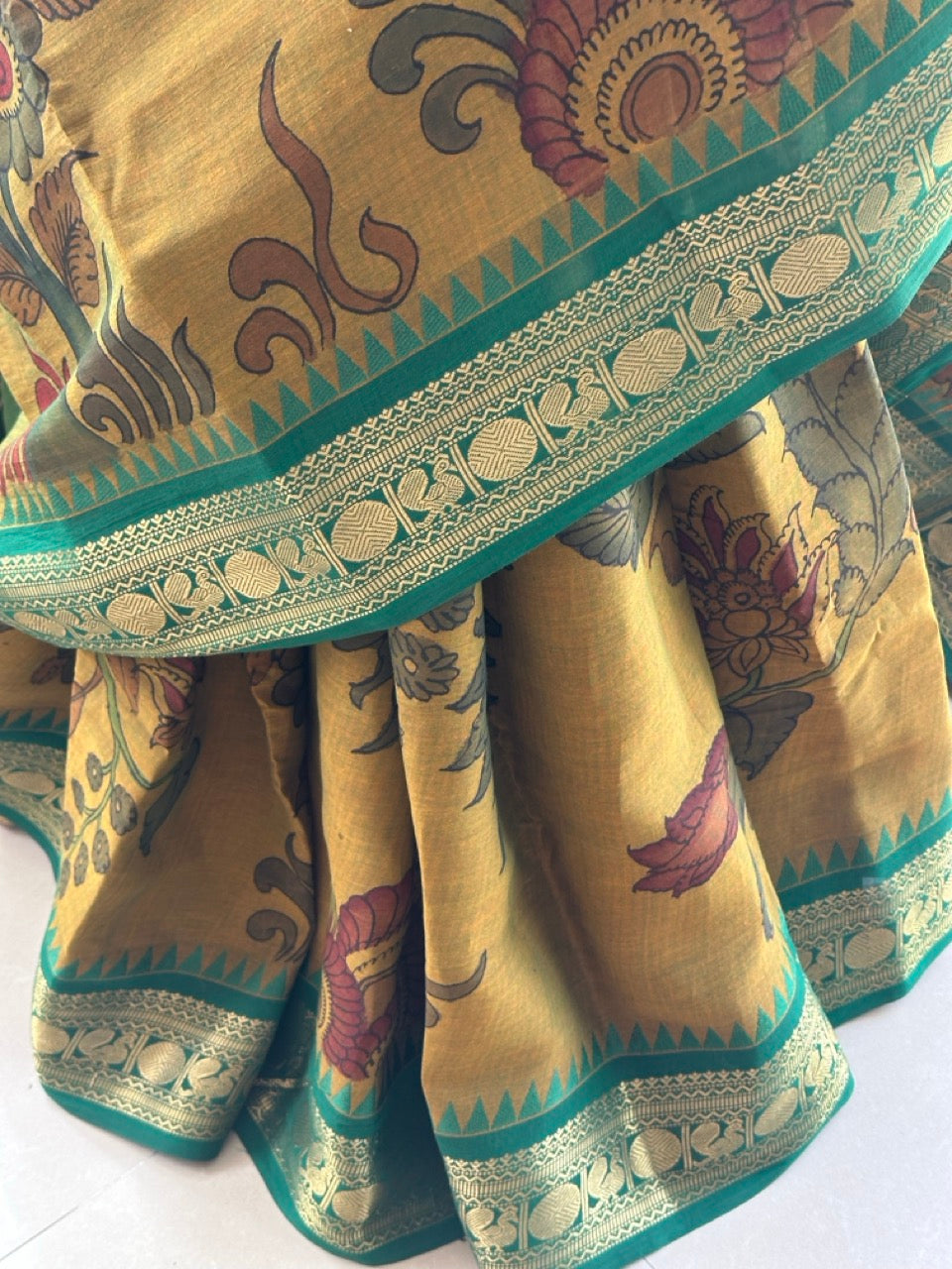 mustard-green-cotton-kalamkari-saree-front-drape-view