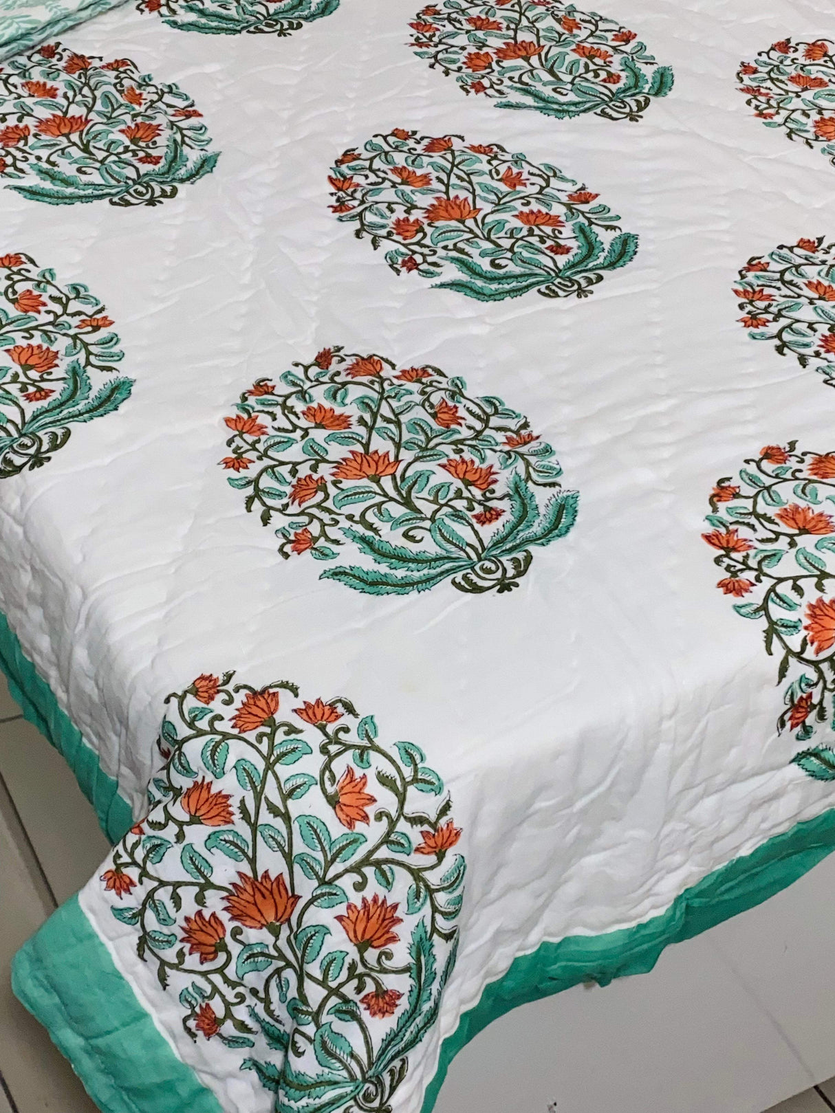 orange-green-single-cotton-quilt-side-view