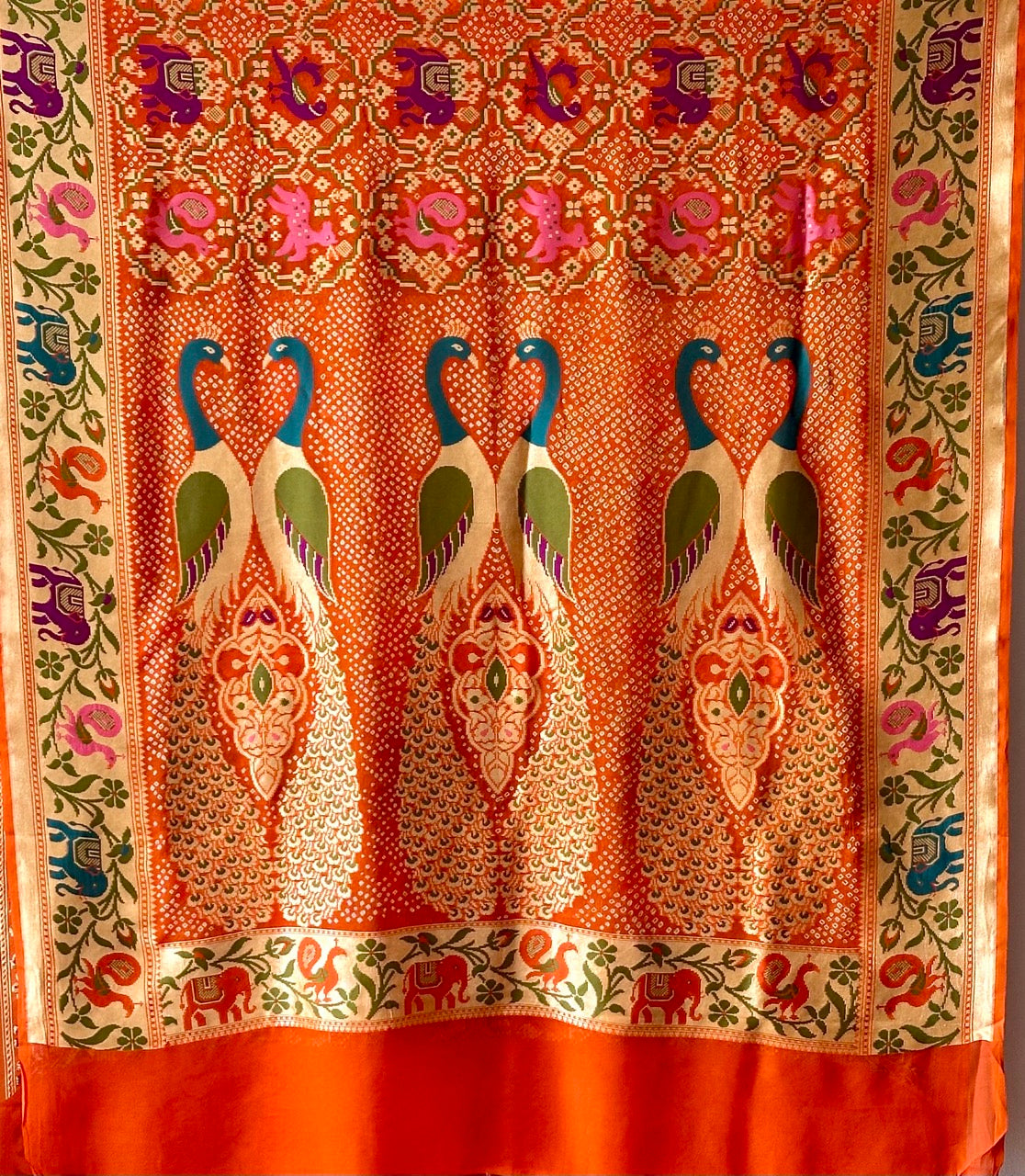 Orange Peacock Theme Patola Style Banarsi Gerogette Meenakari Bandhani Saree
