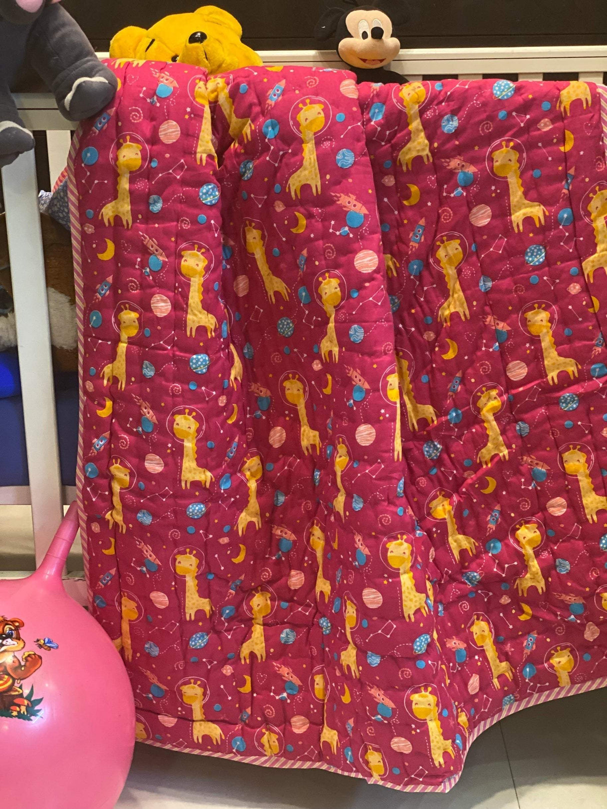 eco-friendly-reversible-quilt-with-pink-tones-and-space-theme-handmade-by-jaipur-artisans-for-uk-and-new-zealand-markets