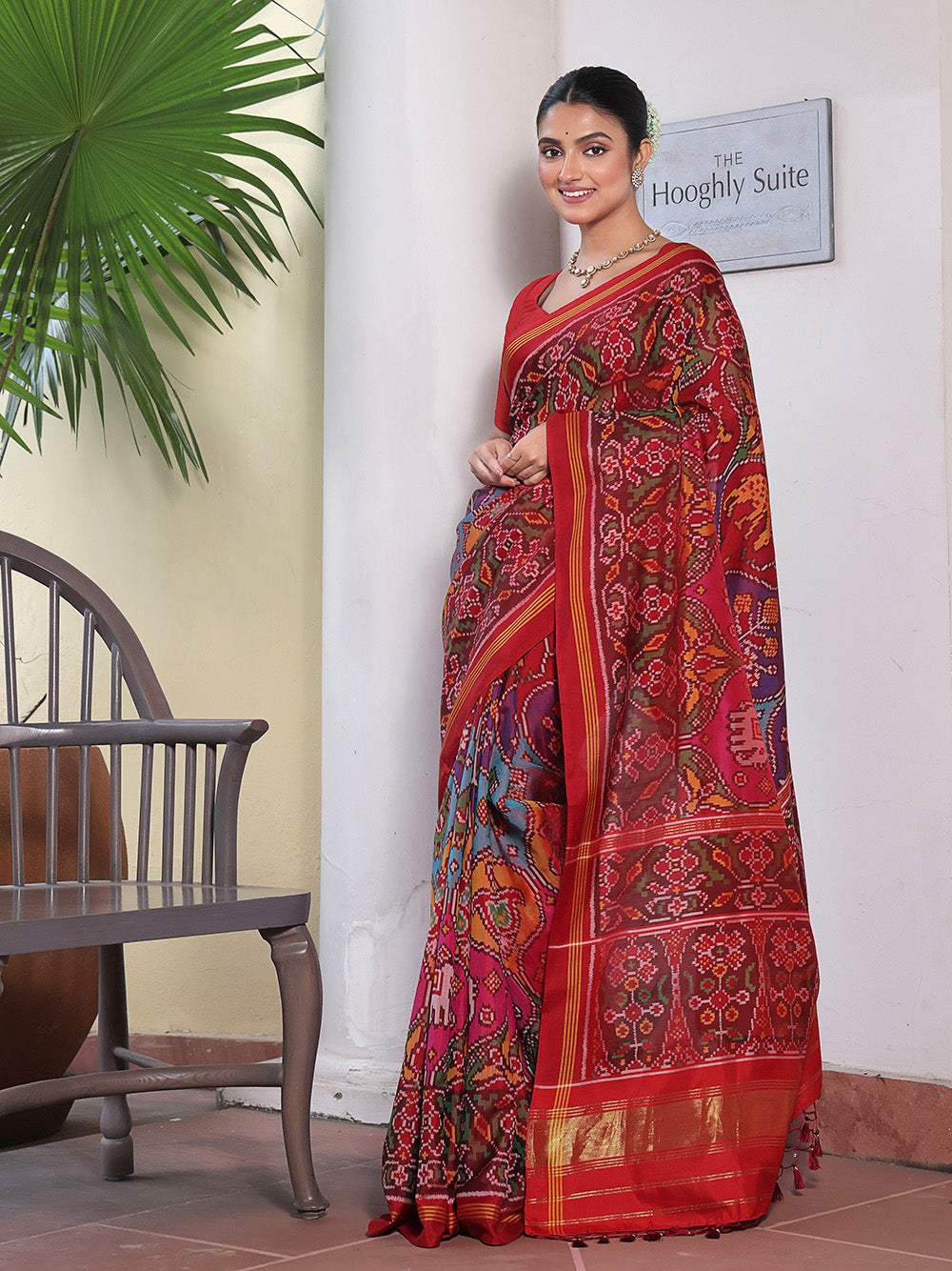 Elegant Handloom Red Mulberry Silk Ikat Patola Saree with Animal Motifs