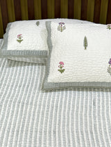 quilted-floral-bedcover-styled-on-bed