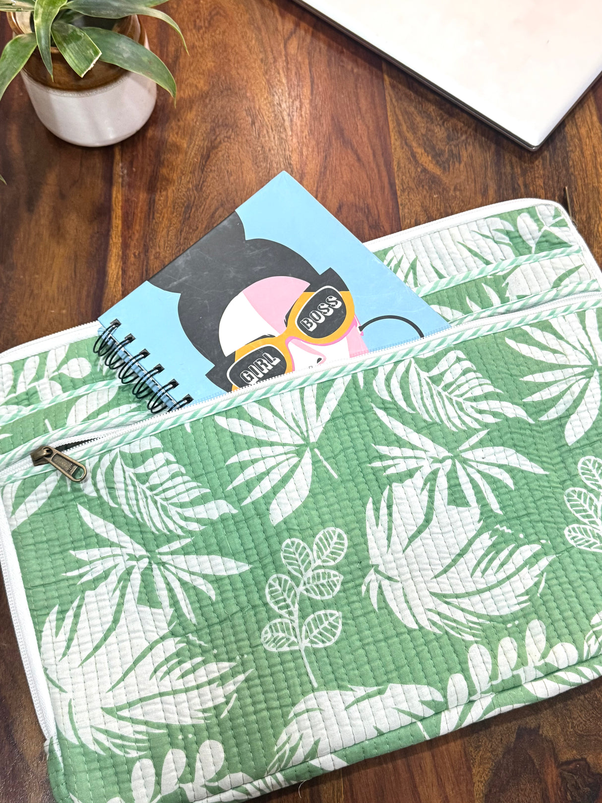 quilted-laptop-sleeve-with-front-pocket-and-leaf-design
