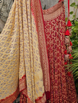 Mesmerizing Red Pure Banarsi Georgette Bandhani Lehenga with Ivory Dupatta