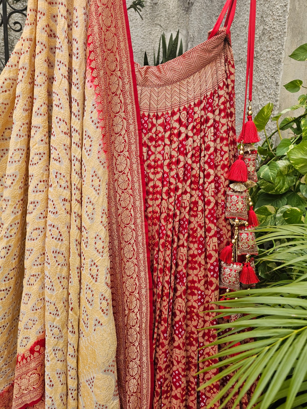 Mesmerizing Red Pure Banarsi Georgette Bandhani Lehenga with Ivory Dupatta