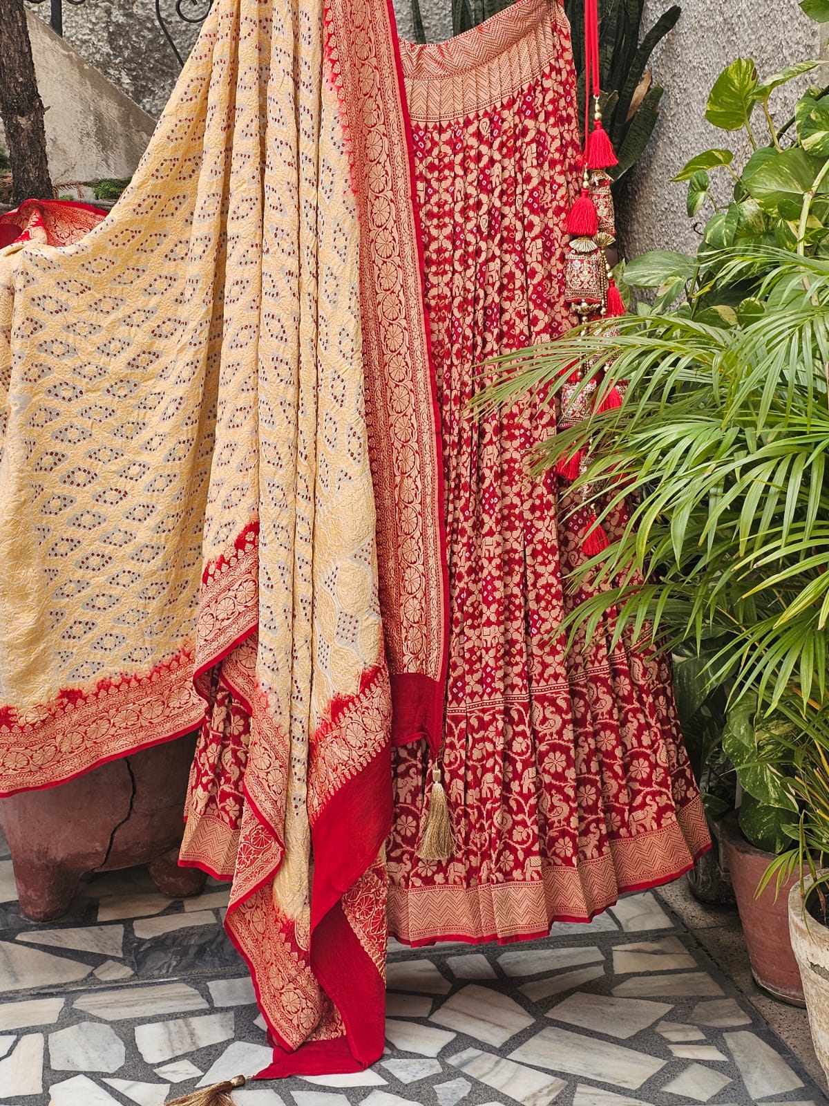 Mesmerizing Red Pure Banarsi Georgette Bandhani Lehenga with Ivory Dupatta