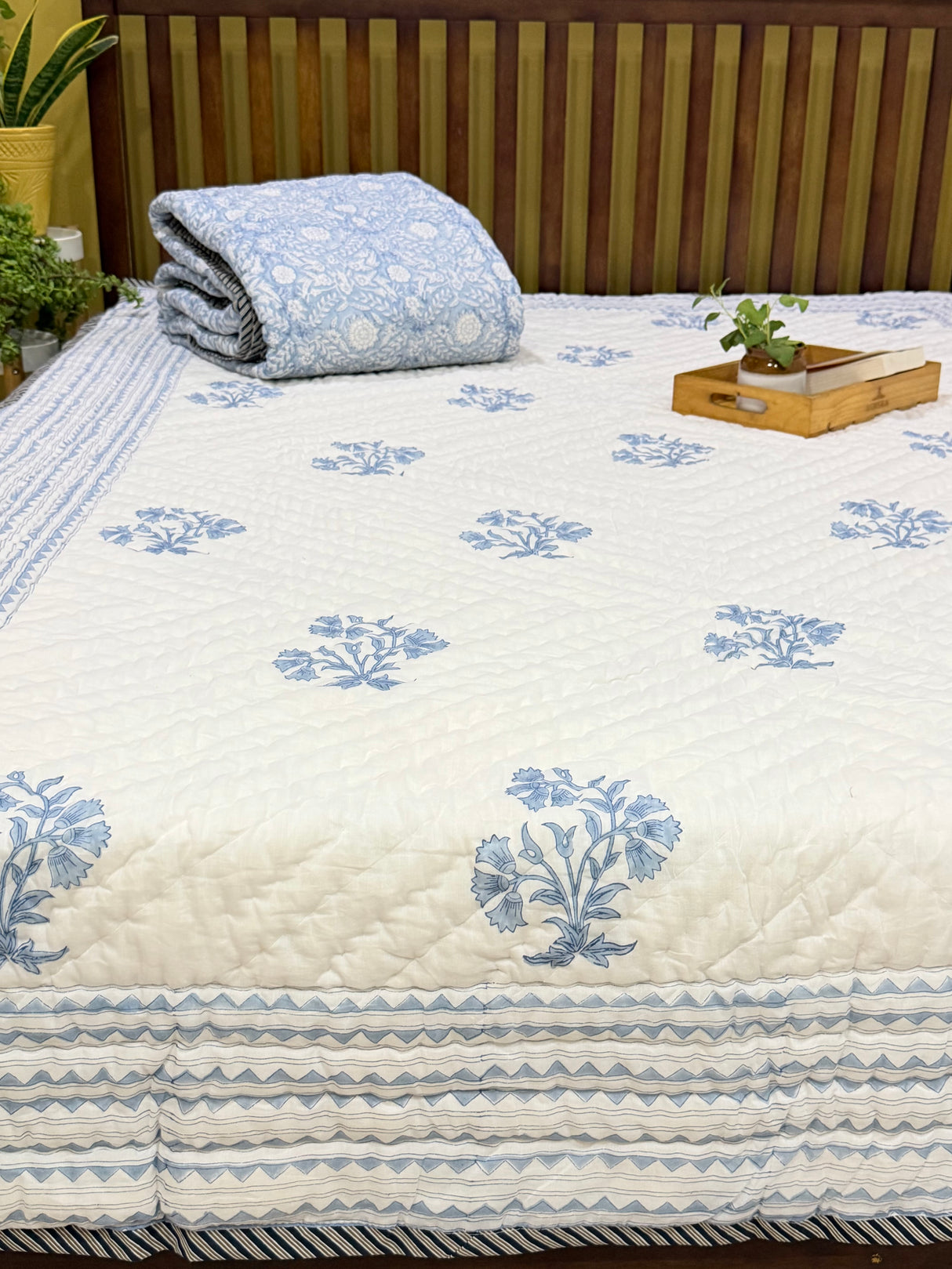 reversible-cotton-quilt-folded-bed-styling