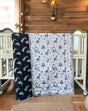 black and white animal theme toddler quilt with soft cotton giraffe and rabbit prints perfect for resale in Australia and UAE