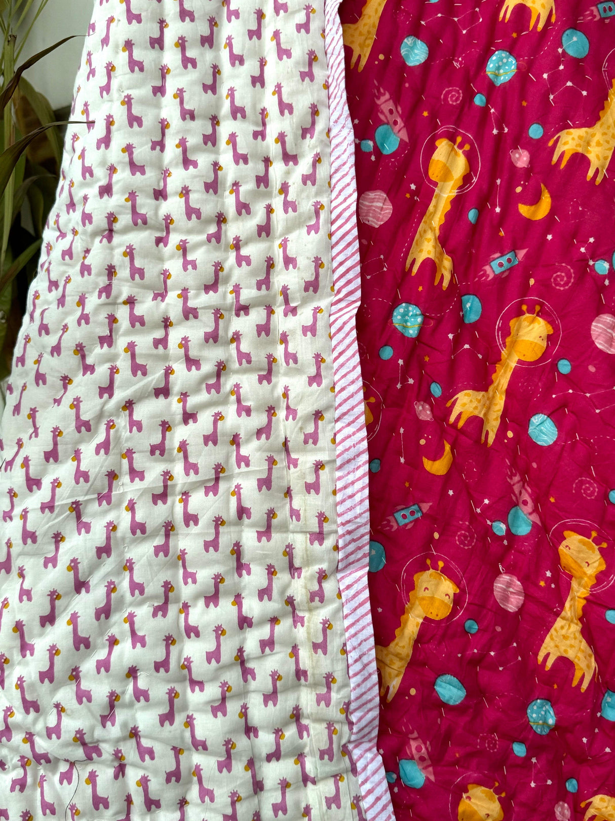 pink-giraffe-and-space-print-quilt-for-babies-made-with-azo-free-dyes-ideal-for-eco-conscious-gifting-in-uk-and-dubai