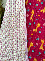 pink-giraffe-and-space-print-quilt-for-babies-made-with-azo-free-dyes-ideal-for-eco-conscious-gifting-in-uk-and-dubai
