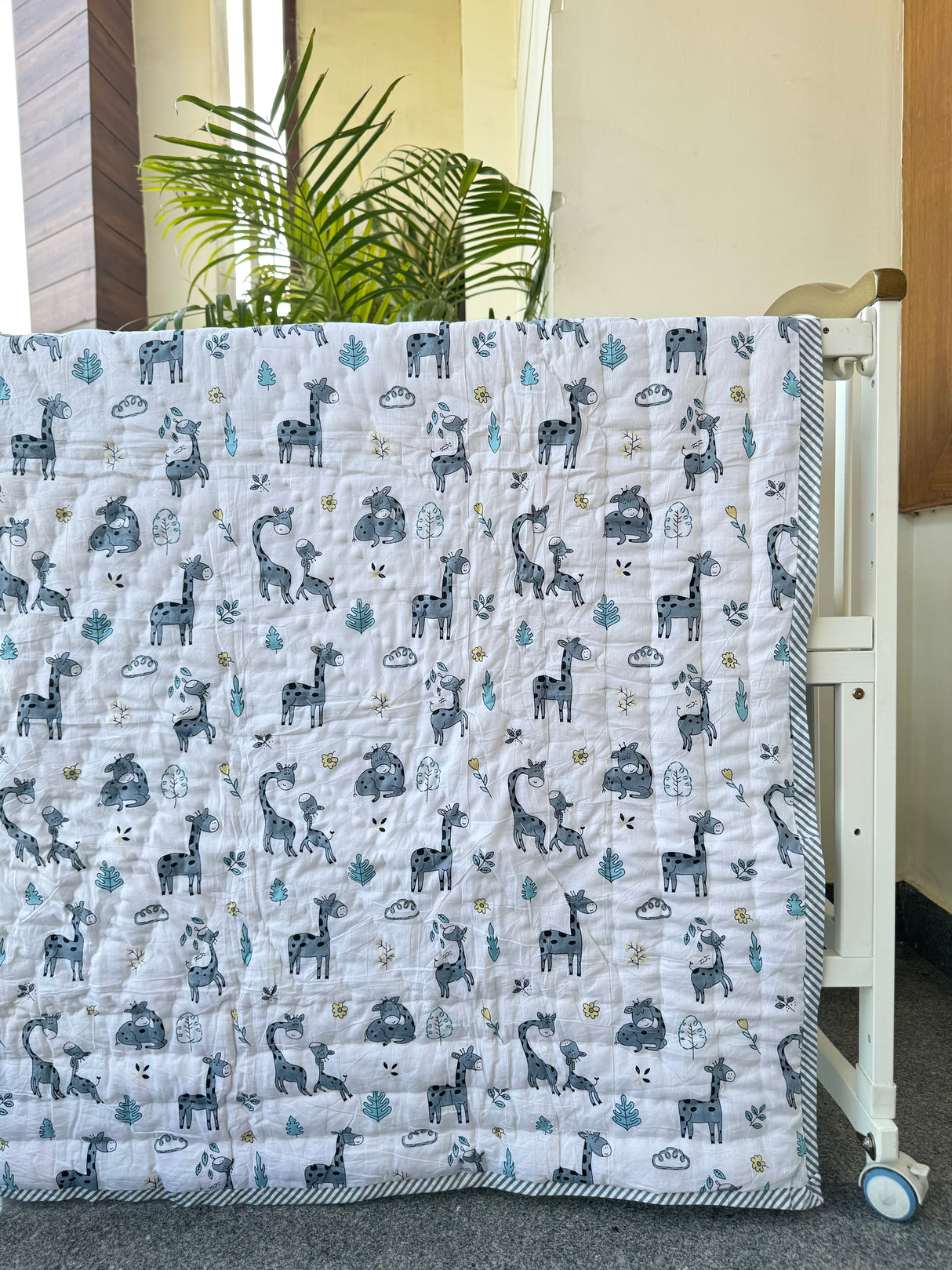 best selling black white gray baby quilt with giraffe rabbit print combo ideal for modern parents in UAE and South Africa