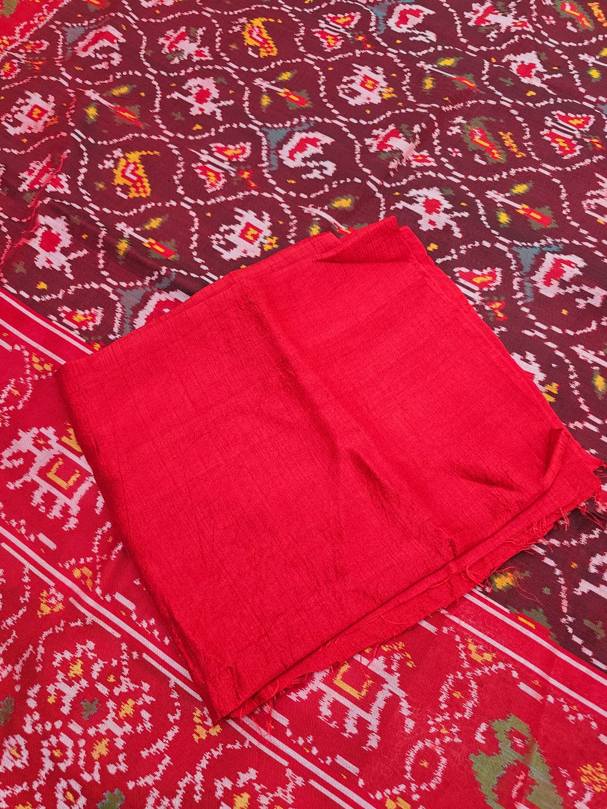 sophisticated-handloom-brown-and-red-mulberry-silk-ikat-patola-saree-with-animal-motifs