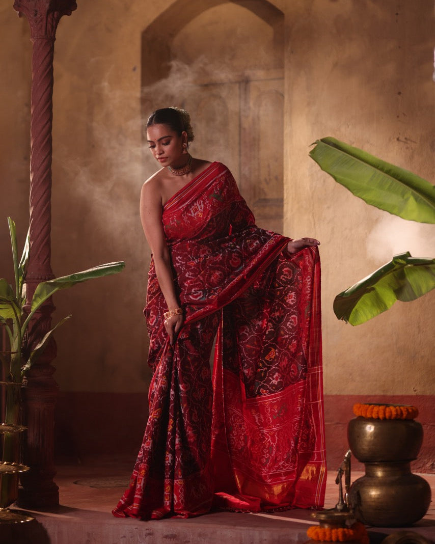 sophisticated-handloom-brown-and-red-mulberry-silk-ikat-patola-saree-with-animal-motifs