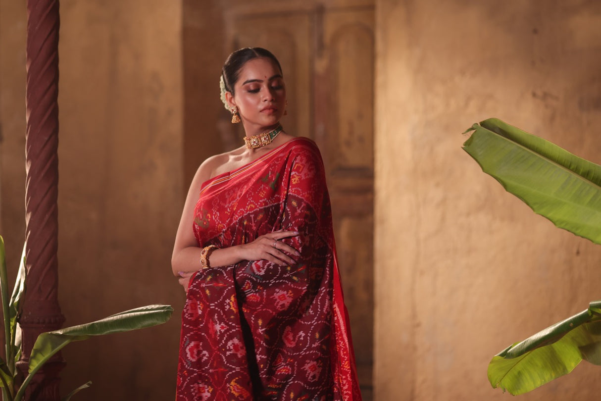 sophisticated-handloom-brown-and-red-mulberry-silk-ikat-patola-saree-with-animal-motifs