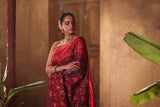 sophisticated-handloom-brown-and-red-mulberry-silk-ikat-patola-saree-with-animal-motifs