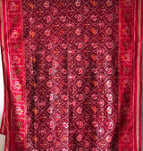 sophisticated-handloom-brown-and-red-mulberry-silk-ikat-patola-saree-with-animal-motifs