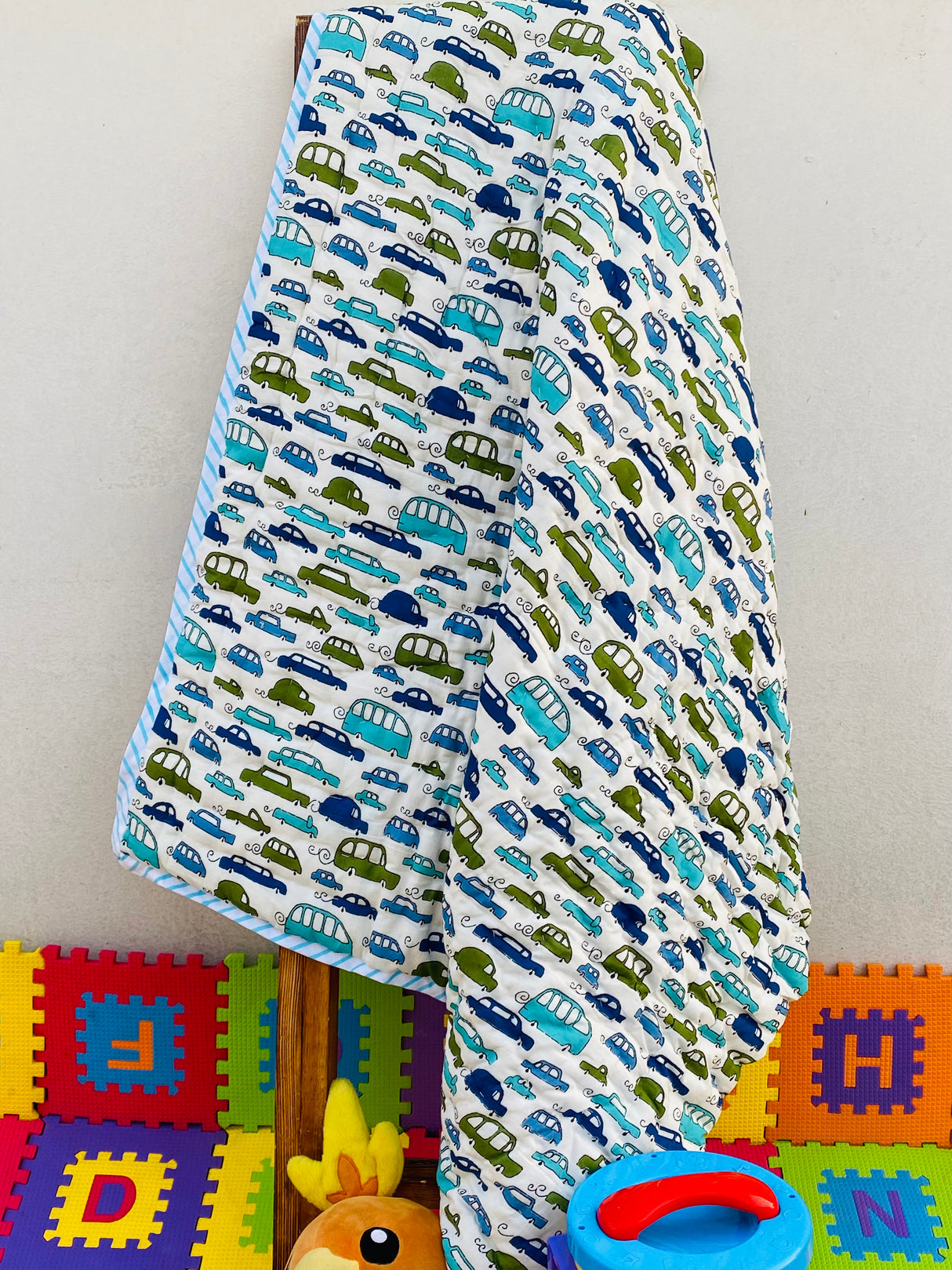 soft handcrafted car theme kids quilt perfect for nursery decor and resale in Dubai and New Zealand