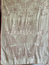 Buy pure Munga silk Bandhani saree in linen beige with soft red ghangura border. Lightweight handloom elegance for daytime festivities at Kapaas Katha.