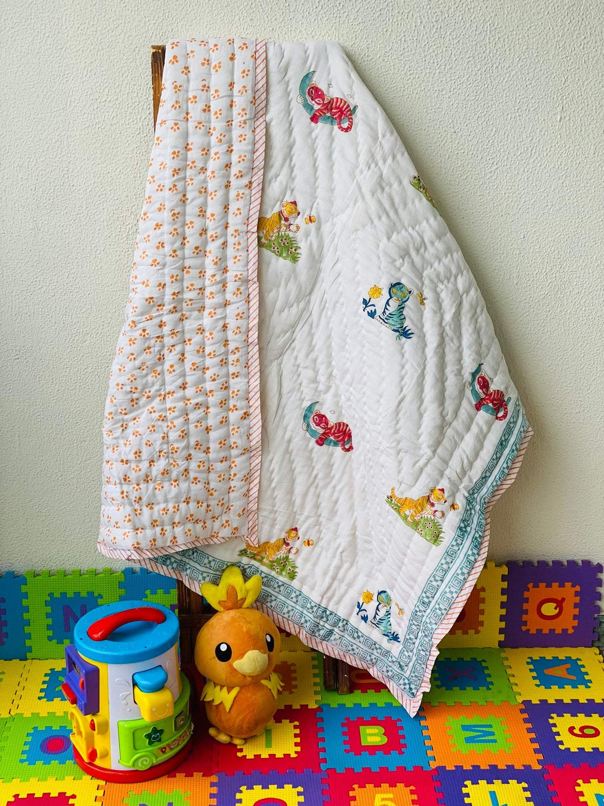 soft mulmul tiger theme baby quilt made by artisans of Jaipur for bulk birthday return gifts
