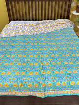 traditional-blockprint-quilt-with-blossom-theme