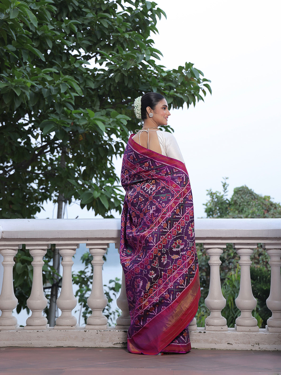 Distinct Handloom Violet and Pink Mulberry Silk Ikat Patola Saree with Nari Kunjar Pattern