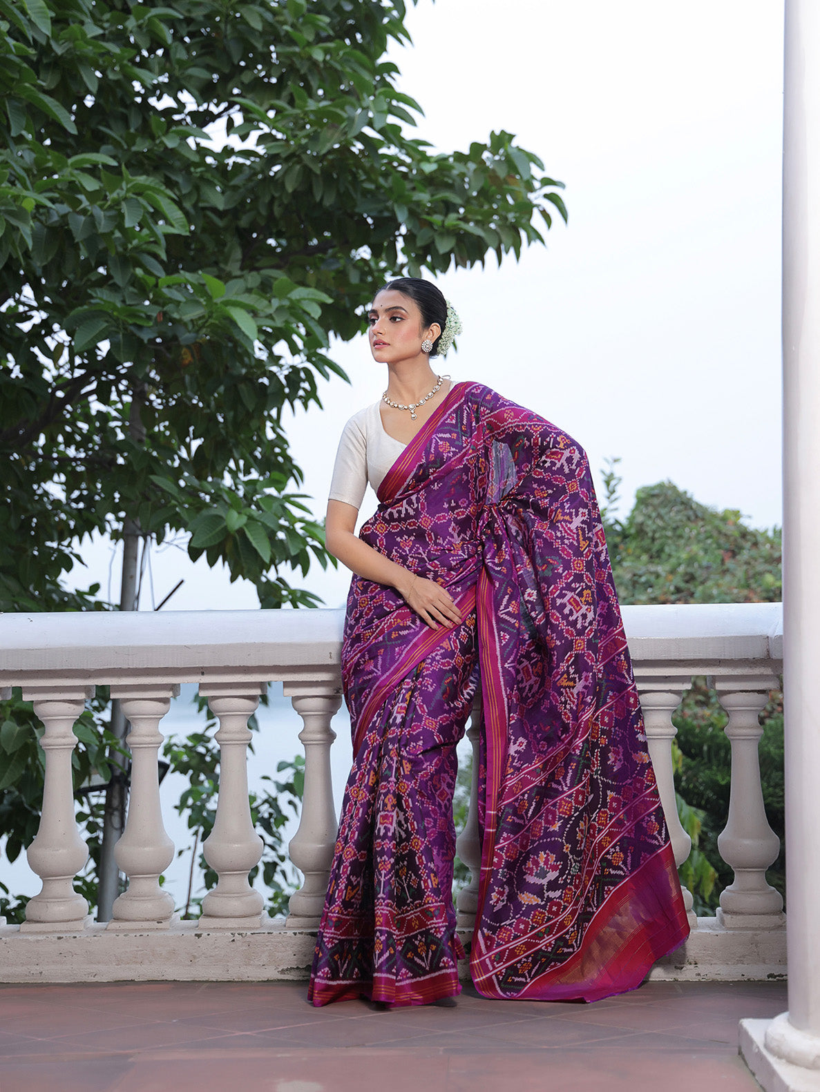 Distinct Handloom Violet and Pink Mulberry Silk Ikat Patola Saree with Nari Kunjar Pattern