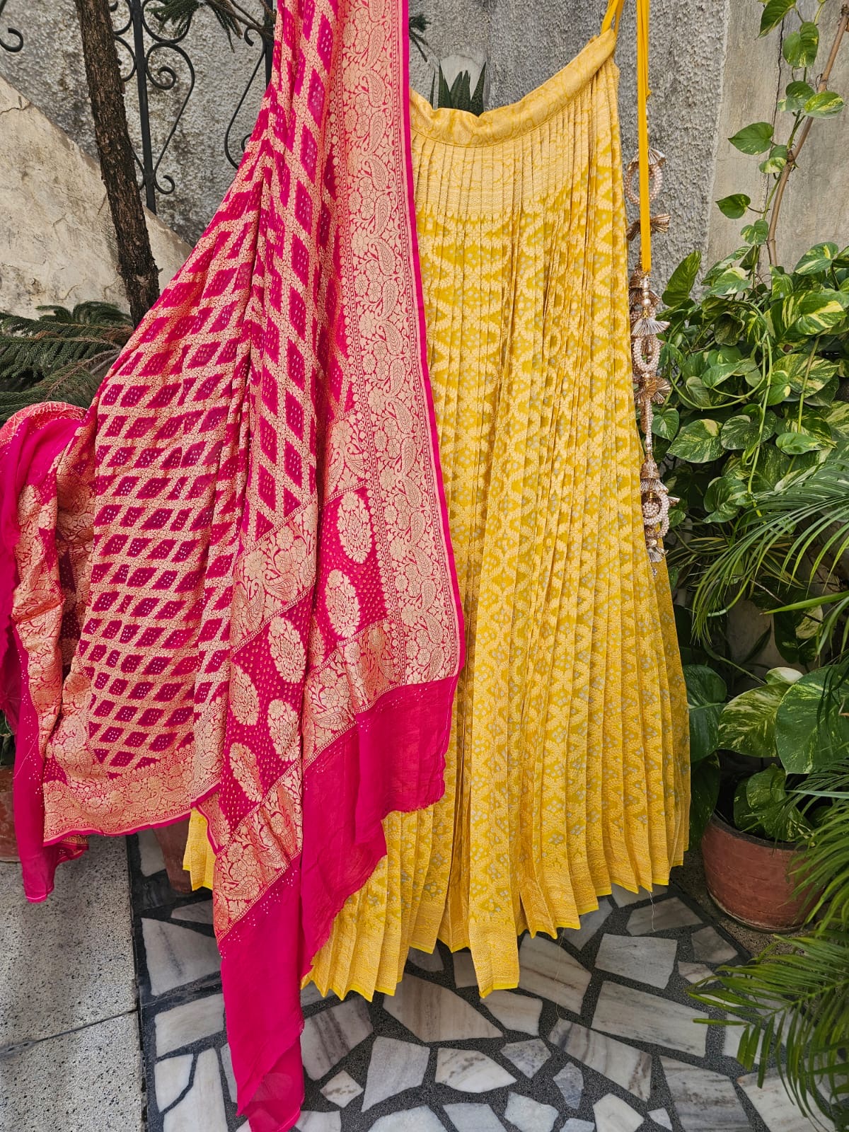 Lovely Yellow and Pink Banarasi Georgette Bandhani Lehenga with Dupatta