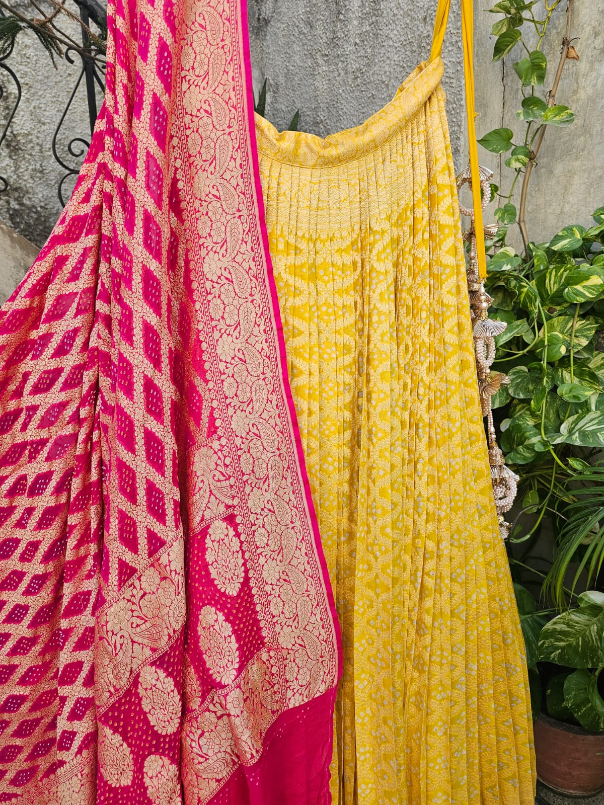 Lovely Yellow and Pink Banarasi Georgette Bandhani Lehenga with Dupatta