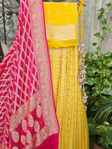 Lovely Yellow and Pink Banarasi Georgette Bandhani Lehenga with Dupatta