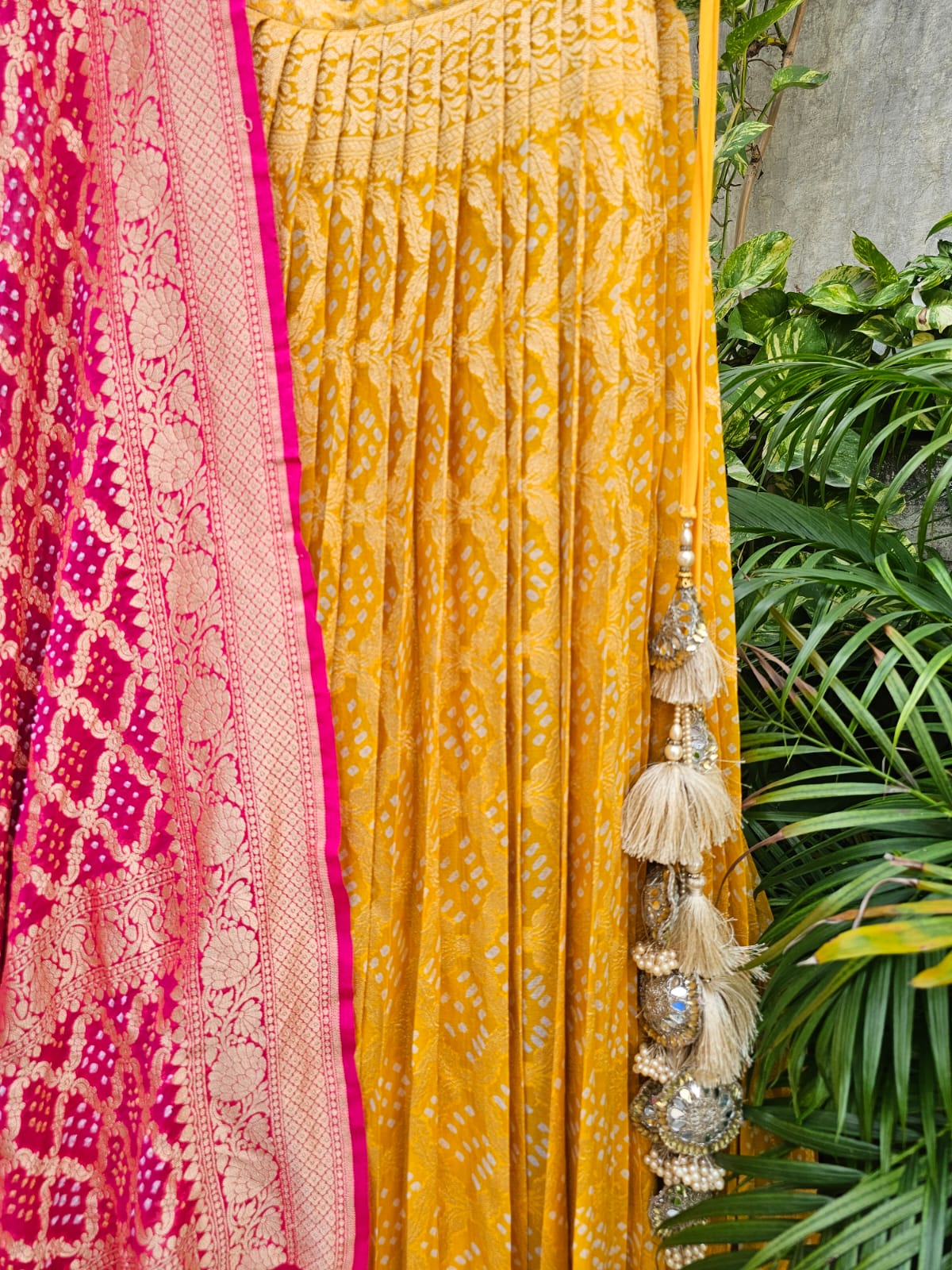 Yellow and Pink Pure Banarsi Georgette Bandhani Lehenga