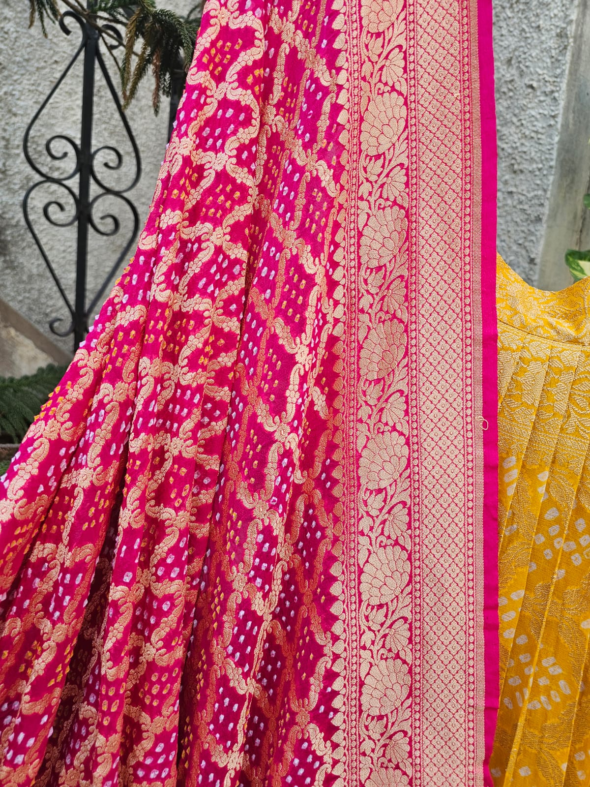 Yellow and Pink Pure Banarsi Georgette Bandhani Lehenga