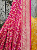 Yellow and Pink Pure Banarsi Georgette Bandhani Lehenga