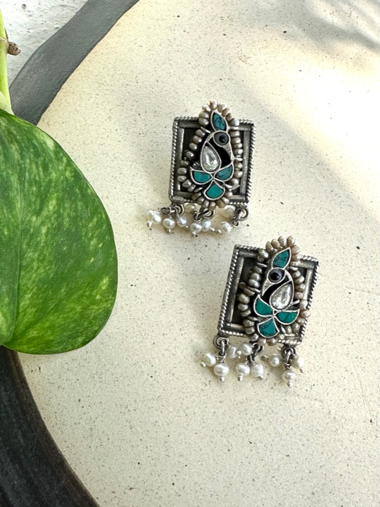 Handcrafted Peacock Silver Earrings with Fusion Stone Work