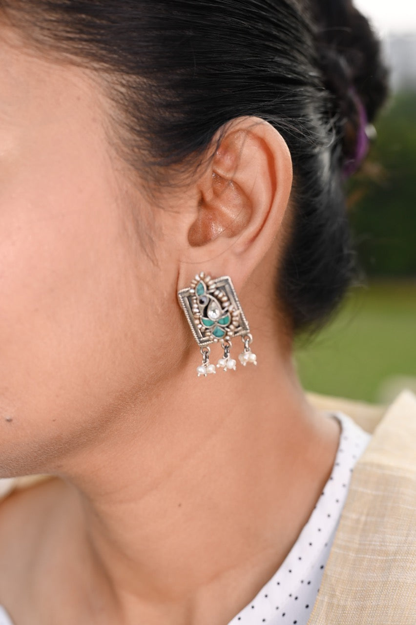 Handcrafted Peacock Silver Earrings with Fusion Stone Work